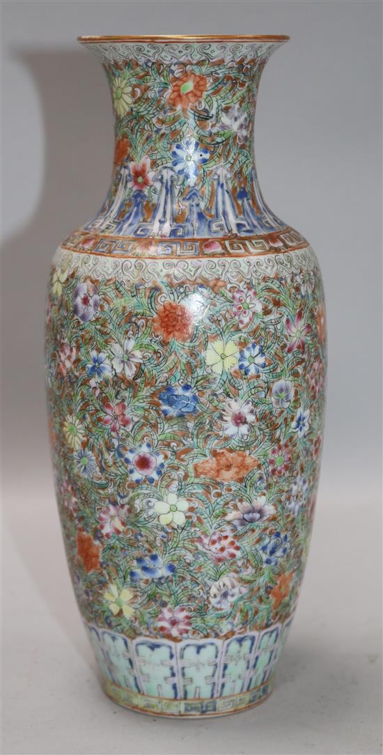 A Chinese famille rose small millefleur vase, Republic period, bearing a Qianlong mark height 23cm